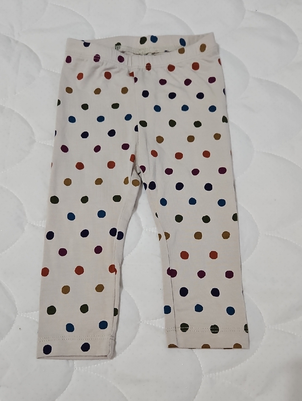 Kyte Baby Polka Dot Leggings On Cream Background